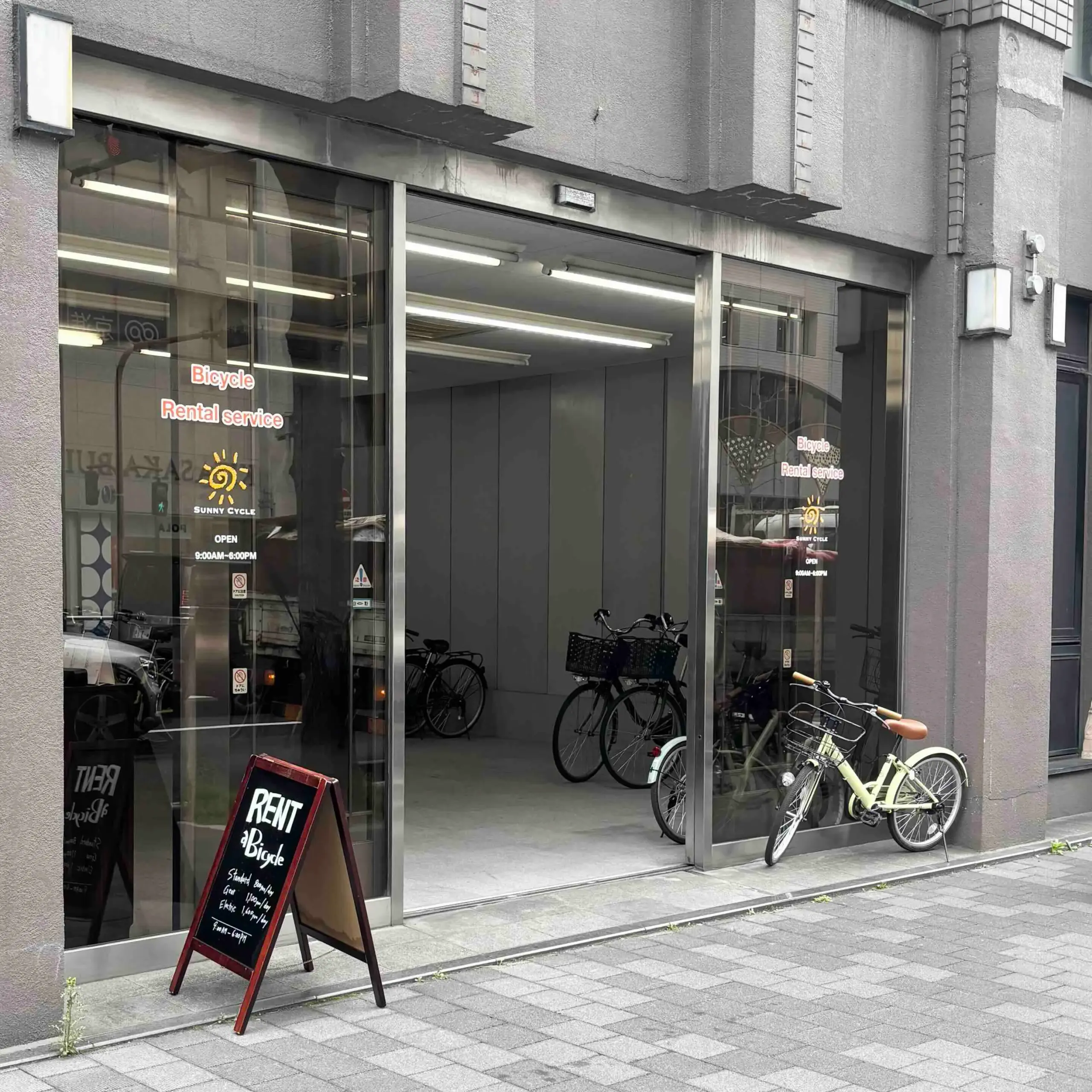 Exterior view of SunnyCycle Gojo bicycle rental shop in Kyoto